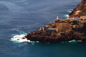 Aerial view of First in Newfoundland Lighting House, Canadian National Historical Site Fort Amherst, ruins of built in WWII bunkers for protection of St. John?s Harbor from German U-boats